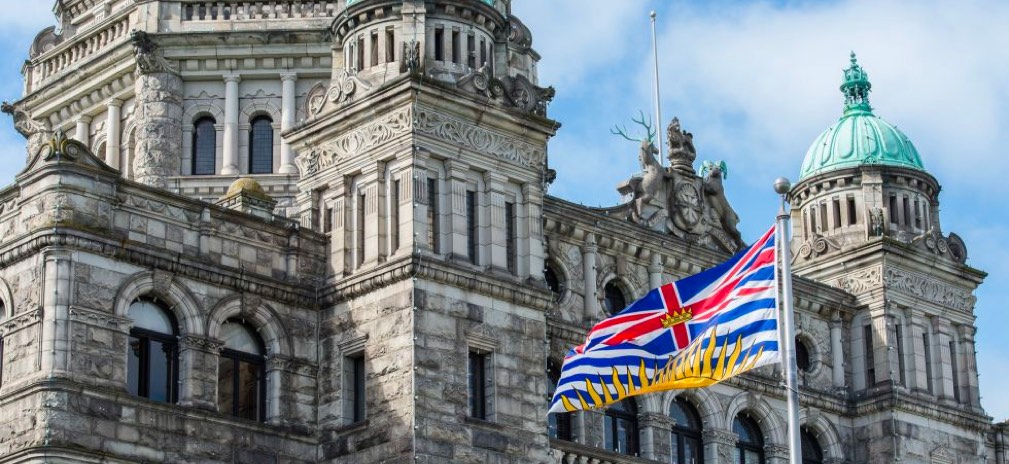 stone building with a British Columbia flag