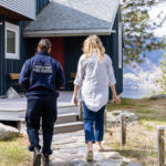 2 women into a house