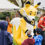 Firesmart mascot talking to kids