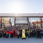 Large group of people taking a picture in front of the Prince George Conference and Civic Centre